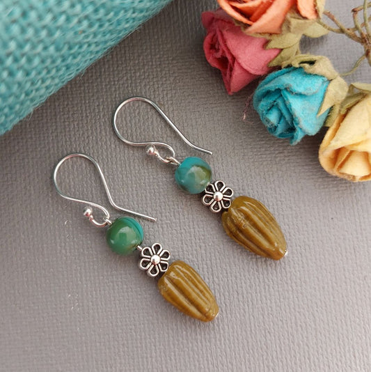 Blue Melon Bloom: Silver Floral Motif Earrings with Melon Teardrop and Round Blue Beads