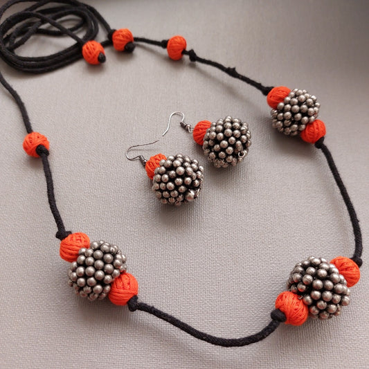 Tangerine Glow: Orange Thread Bead and Silver Toned Beaded Necklace