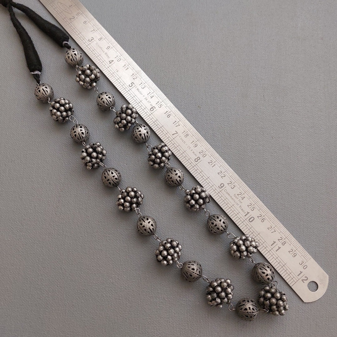 Bohemian Elegance: Silver Toned Beaded Long Necklace with Tie-Back