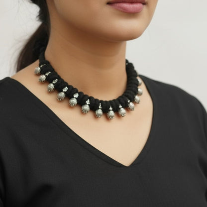 Desi Threads: Black Thread Bead and Silver Bead Motif Necklace and Earring