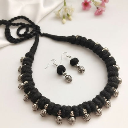 Desi Threads: Black Thread Bead and Silver Bead Motif Necklace and Earring