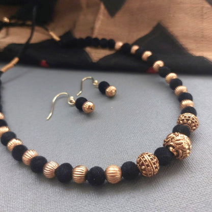 Black Beauty: Black and Golden Beads Necklace