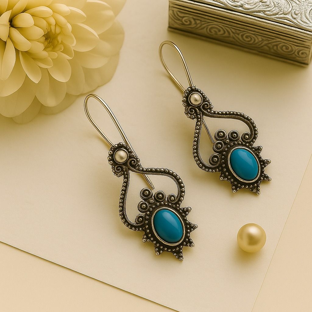 Ripple Curve: Silver Tone Blue Stone Earring