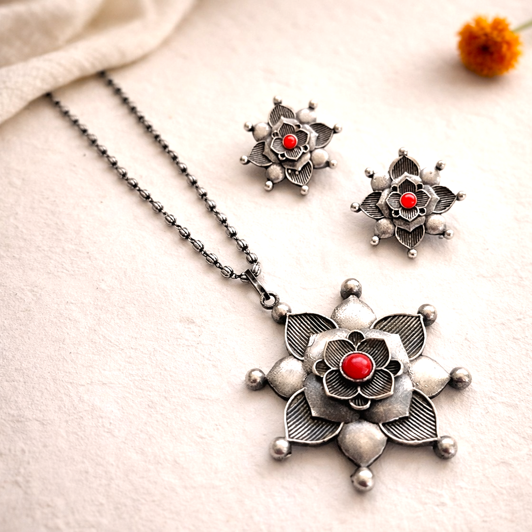 Silver Zenith: Silver Toned Coral Stone Pendant and Earring Set