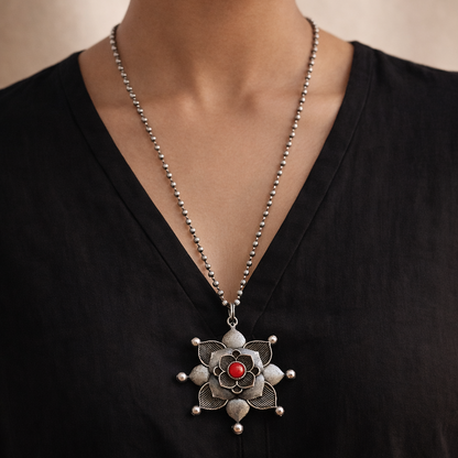 Silver Zenith: Silver Toned Coral Stone Pendant and Earring Set