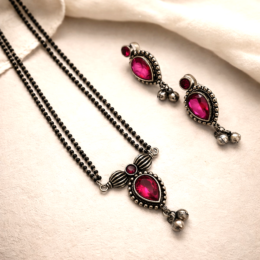 Ishya: Majenta Srone Double Layered Chain Pendant and Earring set