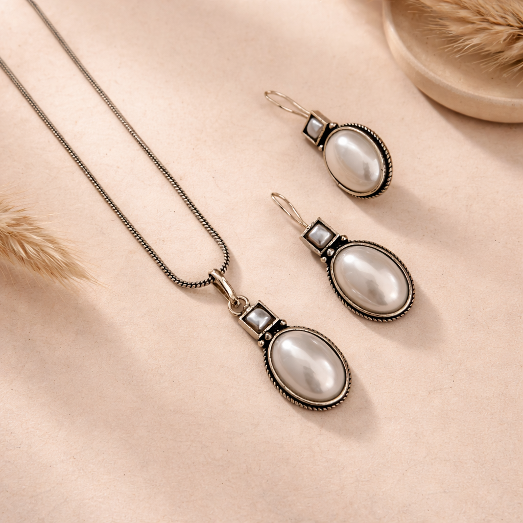 Aashirs Bestseller Combo: Moonmist Pendant and Earring Set/ Classic Pearl Link Bracelet