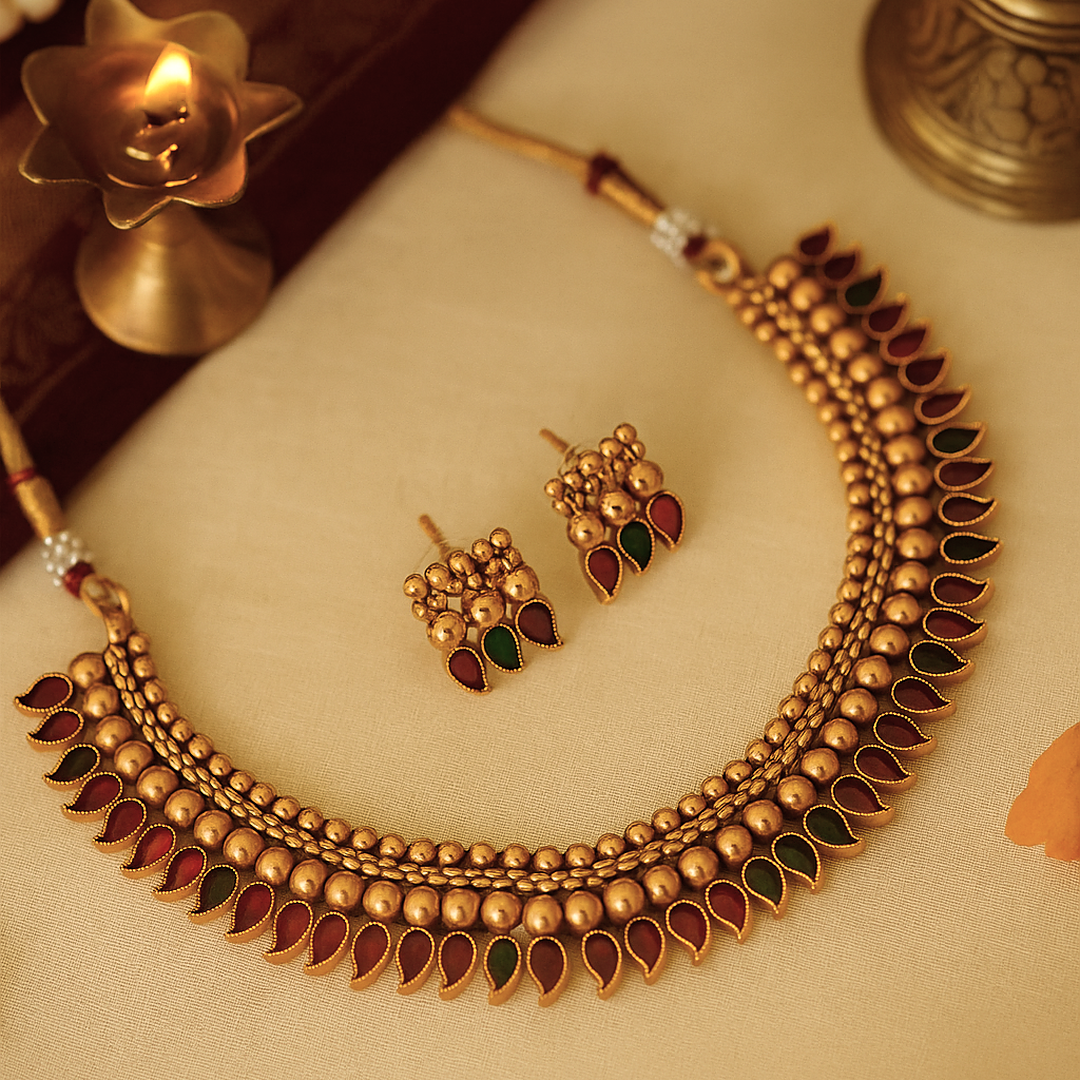 Meher :Gold Toned Stone Studded Necklace and Earring Set