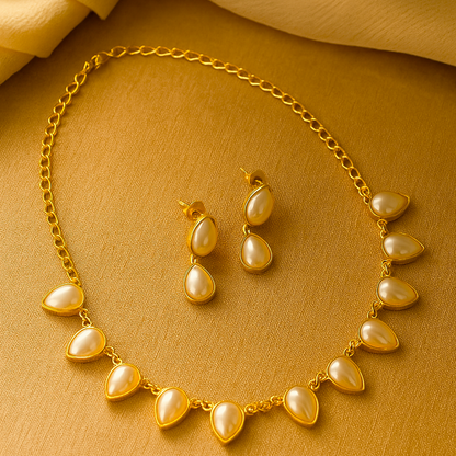 Suhani: Gold toned Pearl Necklace and Earring Set