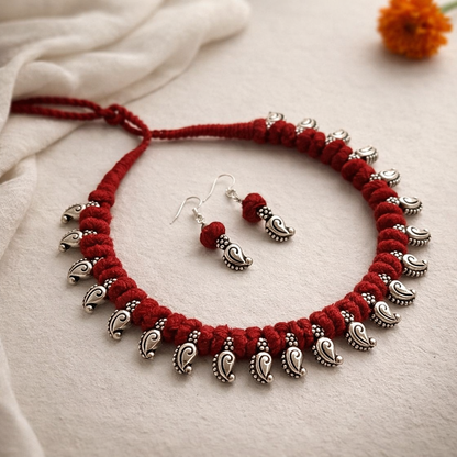 Desi Threads: Red Thread Bead and Silver Mango Motif Necklace and Earring