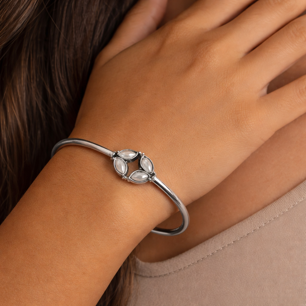 Twin Leaf Glow: Silver Toned Pearl Bracelet
