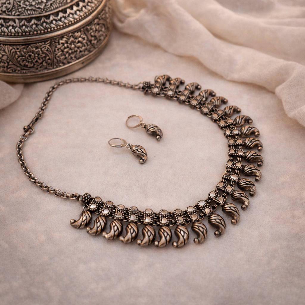 Utsav Manjiri: Antique Silver Toned Necklace and Earring Set