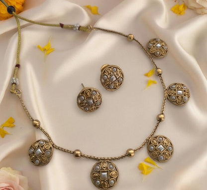Chandrika: Gold Toned Pearl Necklace and Earring Set