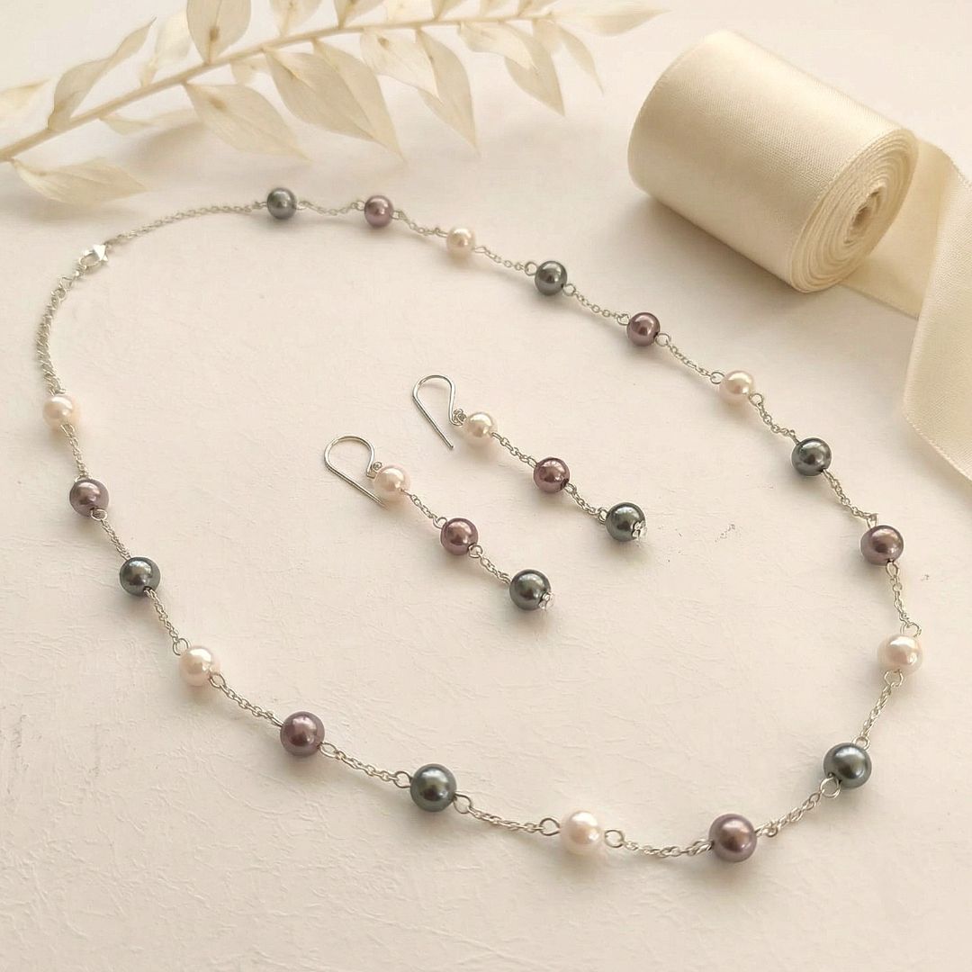 Muted Aura: Minimalist Pearl Necklace and Earring Set