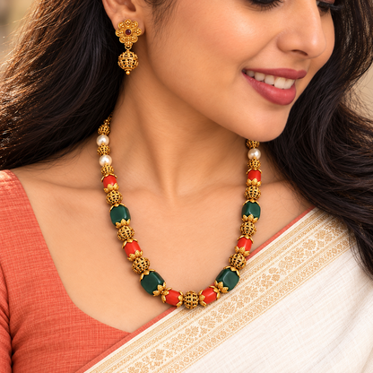 Kalyani: Gold Toned Green Bead and Coral Bead Necklace and Earring Set