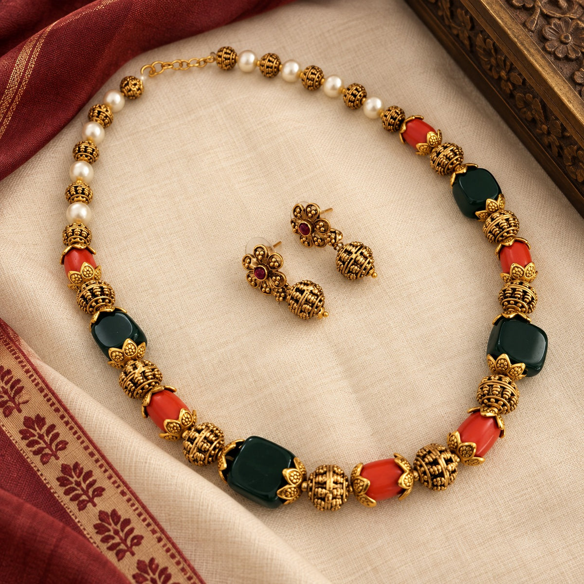 Kalyani: Gold Toned Green Bead and Coral Bead Necklace and Earring Set