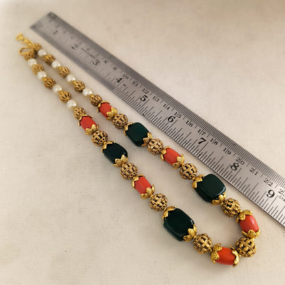 Kalyani: Gold Toned Green Bead and Coral Bead Necklace and Earring Set