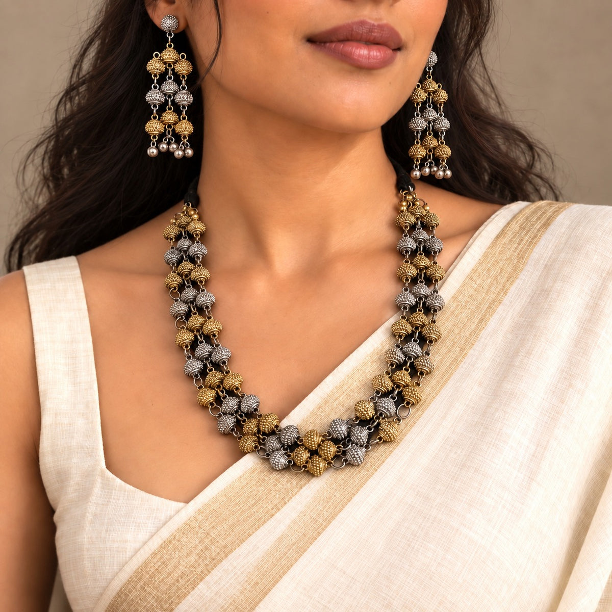 Samyukta: Dual Tone Layered Statement Necklace and Earring Set