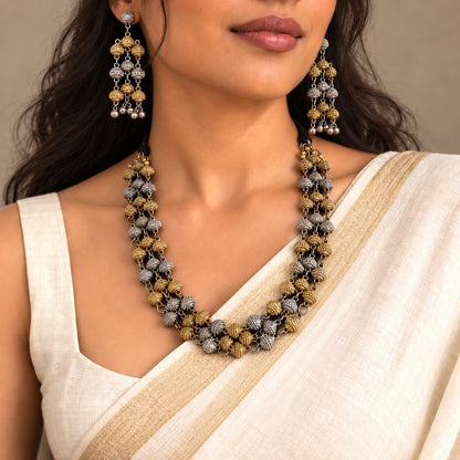 Samyukta: Dual Tone Layered Statement Necklace and Earring Set