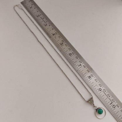 Emerald Halo: Simple Pendant and Earring Set