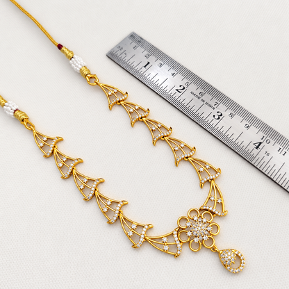 Mihira: Gold-Toned Floral & Fan Motif Necklace and Earring Set