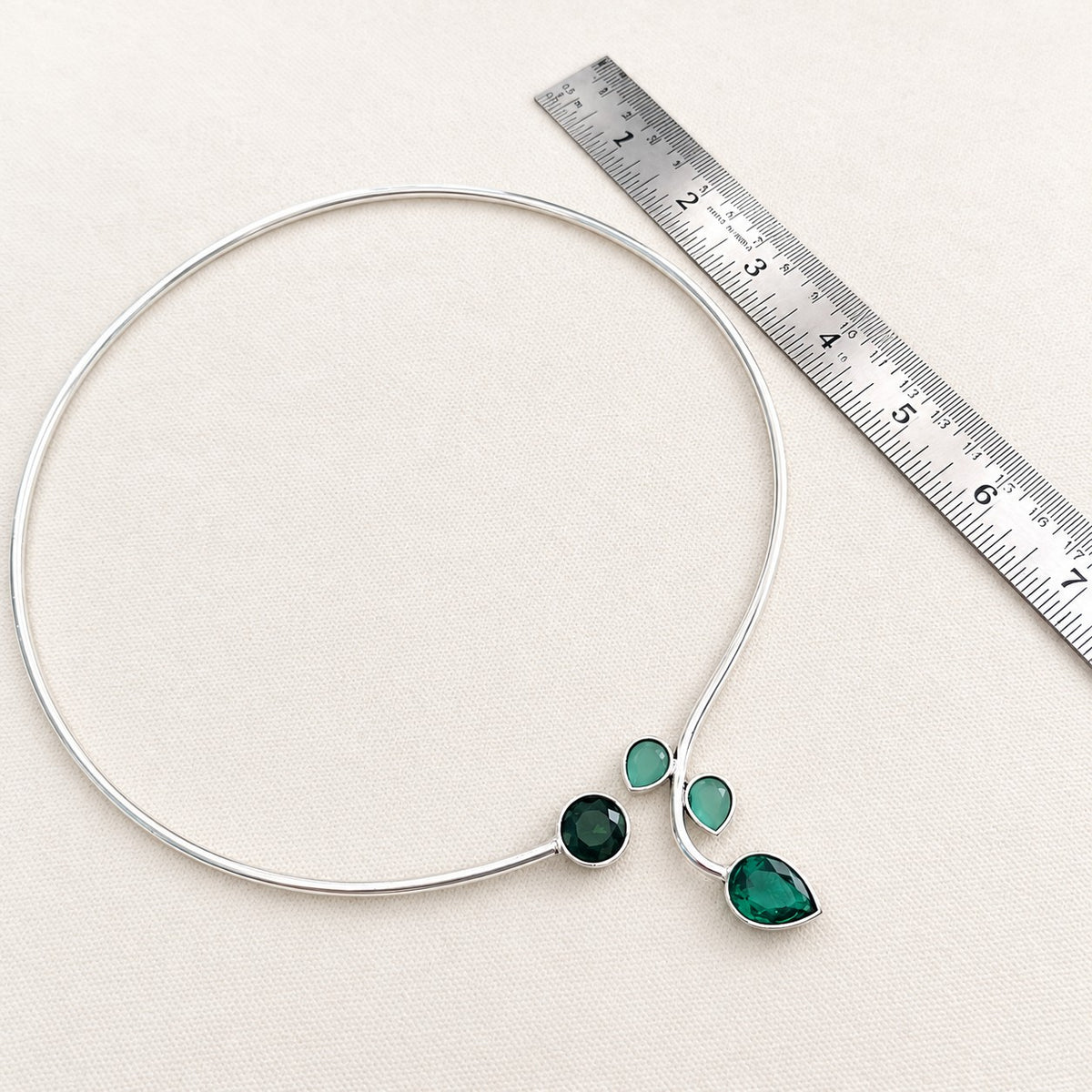 Rajata: Silver Toned Hasli With Deep Green and Light Green Stones