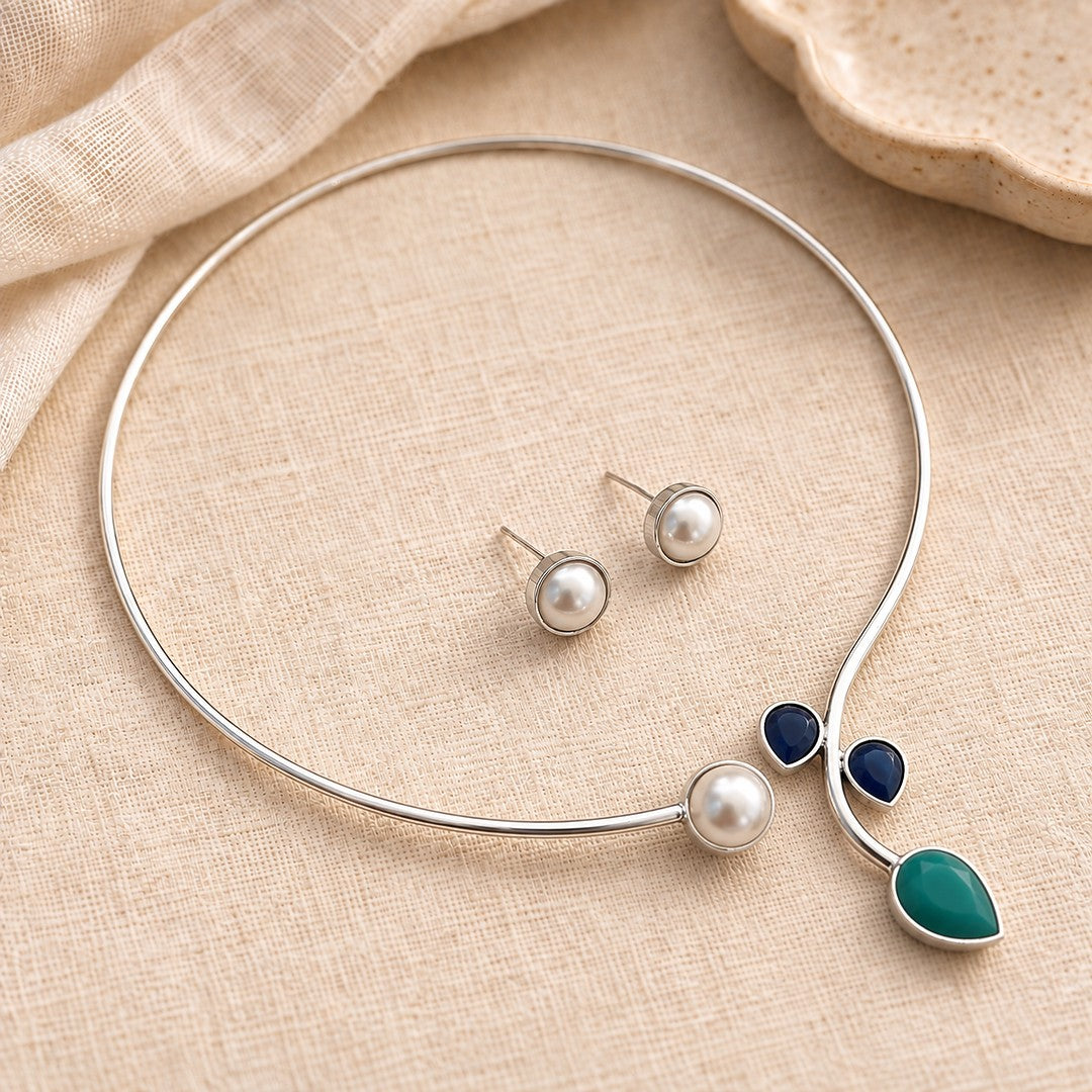 Rajata : Silver Toned Hasli with Pearl , Teal, and Deep Blue Stones