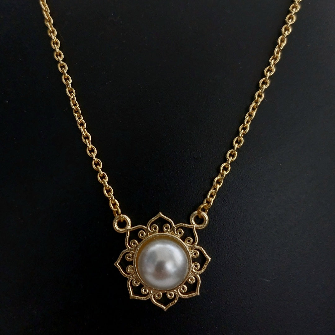 Golden Lotus: Pearl Studded Gold Toned Pendant and Earring Set