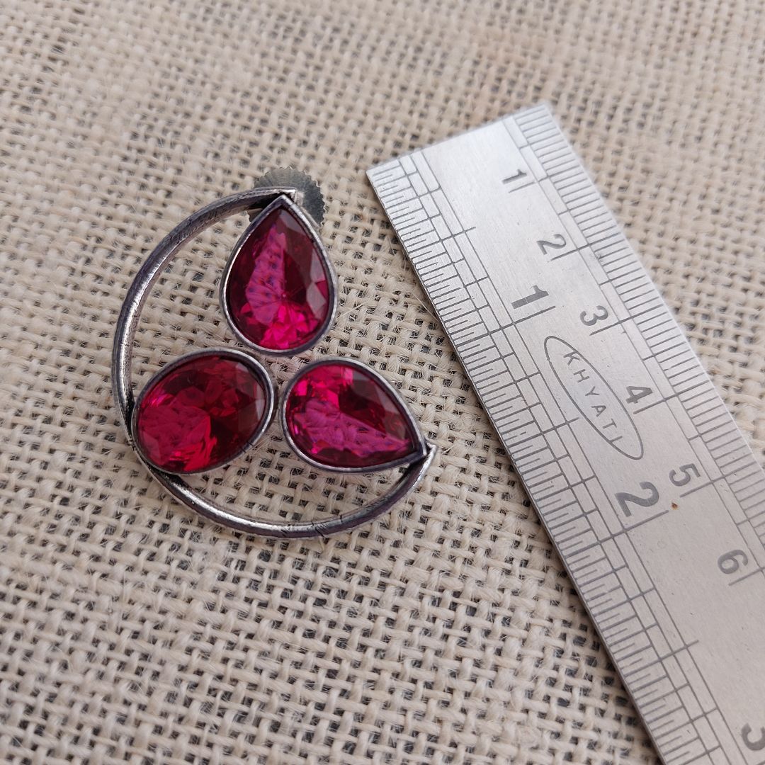 Radiant Pink Glamour: Silver-Toned Ear Studs Adorned with Bright Pink Stones
