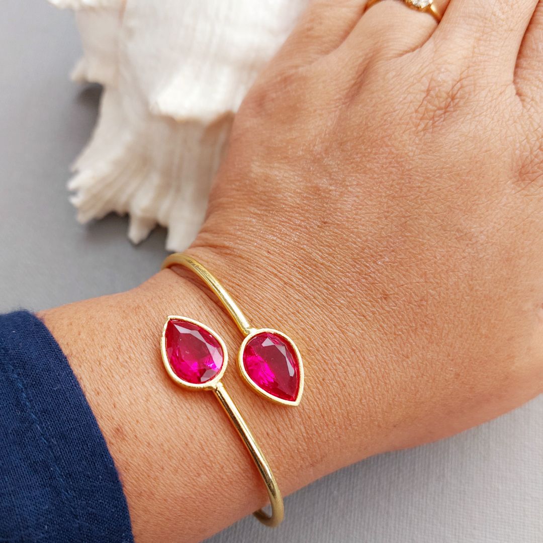 Rose Gild: Gold Toned Bracelet with Bright Pink Stones