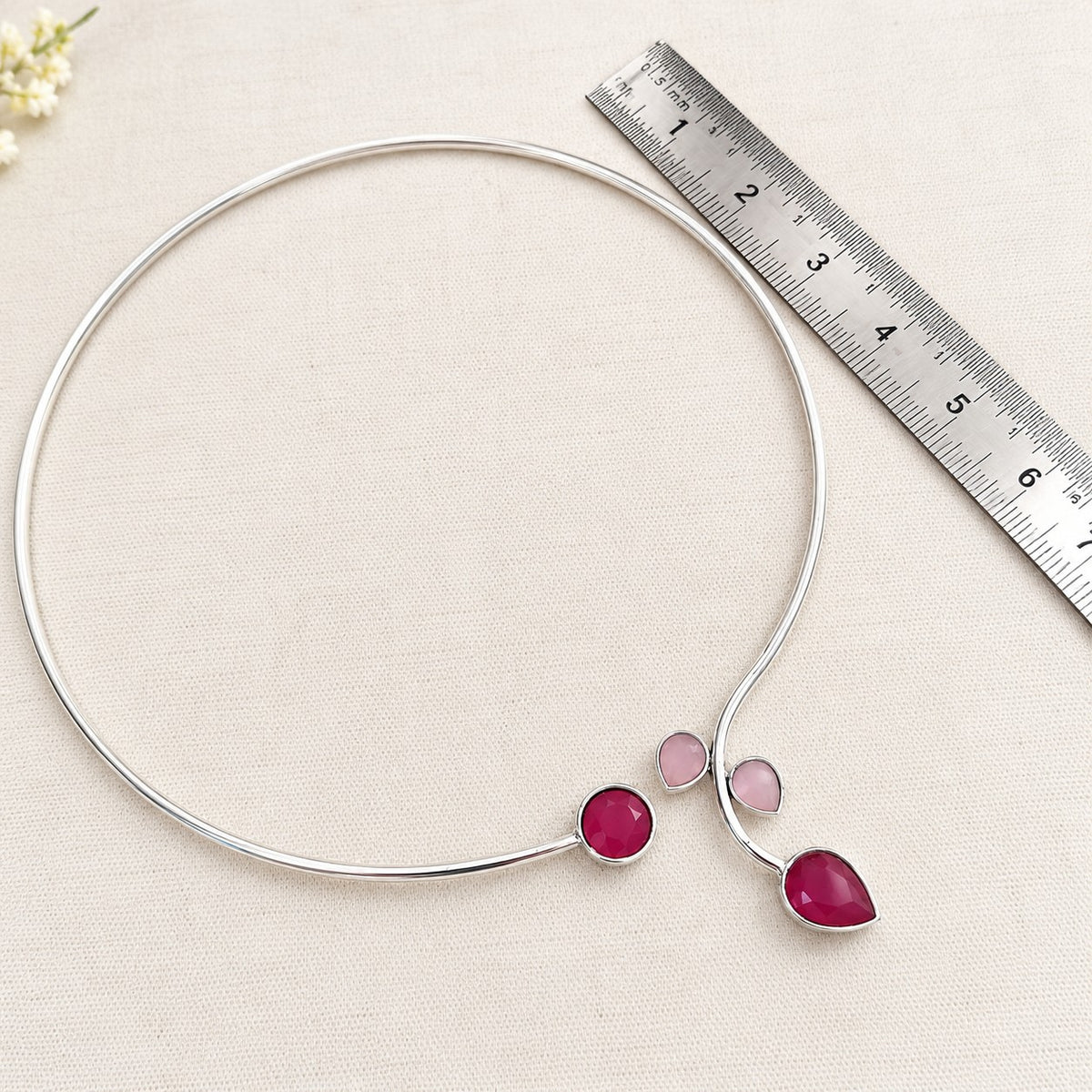 Rajata: Silver Toned Hasli with Deep Pink and Soft Pink Stones
