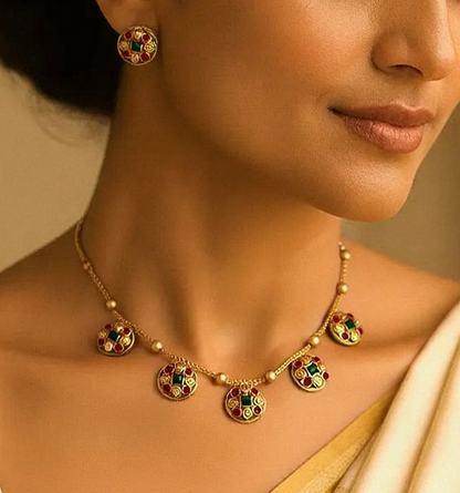 Chandrika: Gold Toned Pink and Green Stoned Necklace and Earring Set