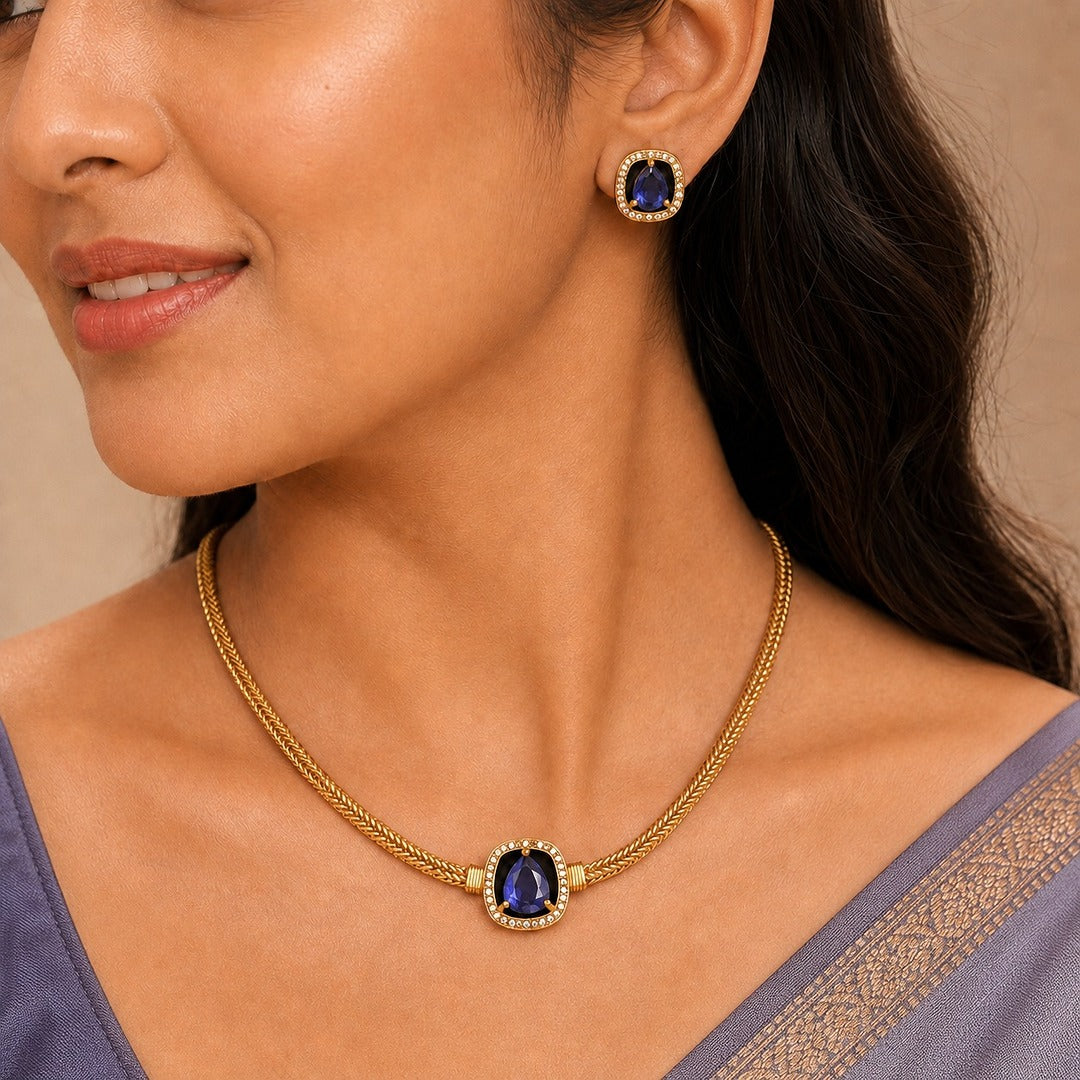 Abhaa: Minamalist Purple Stone Gold Toned Necklace and Earring Set