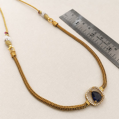 Abhaa: Minamalist Purple Stone Gold Toned Necklace and Earring Set