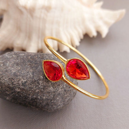 Imperial Red Gild : Gold Toned Bracelet with Orange Stones