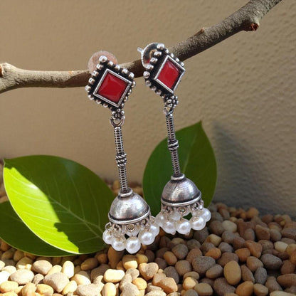 Jhumka Delight: Red Stone Silver Toned Jhumka