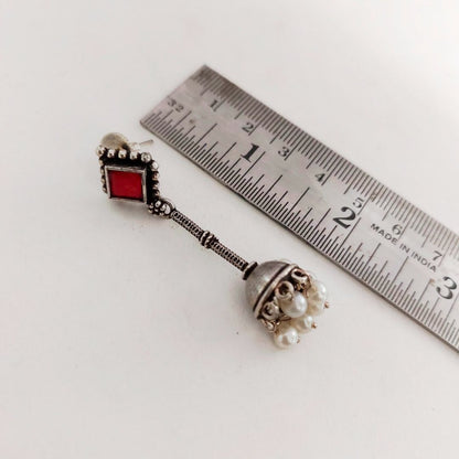 Jhumka Delight: Red Stone Silver Toned Jhumka