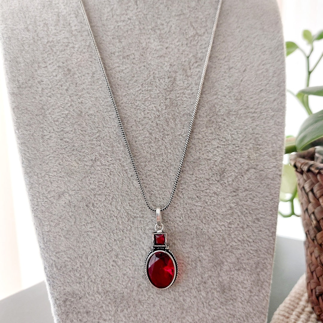 Ruby Glow: Silver Toned Pendant and Earring Set