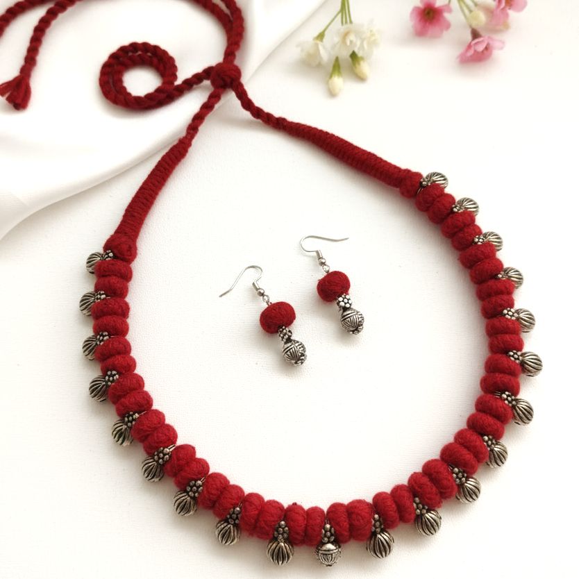 Desi Threads: Red Thread Bead and Silver Bead Motif Necklace and Earring