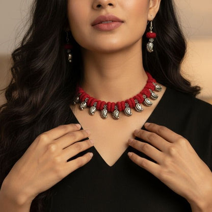Desi Threads: Red Thread Bead and Silver Mango Motif Necklace and Earring