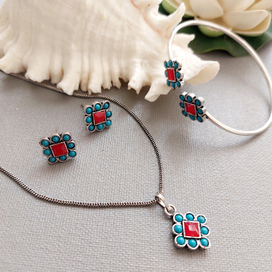 Turquoise Garnet Fusion: Red Stone Pendant Earring and Bracelet Set in Silver Tone