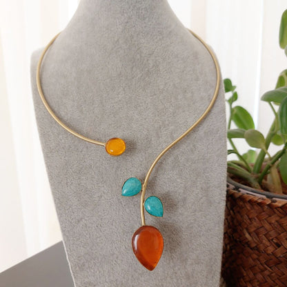 Sunset Skyline: Vibrant Orange and Blue Stone Studded Hasli Brass Necklace