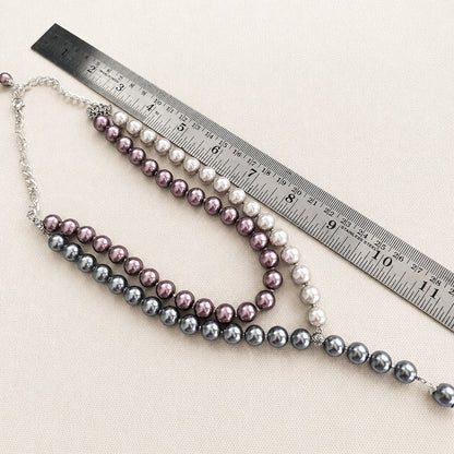 Twilight Symphony: Pearl Cascade Necklace and Earring Set