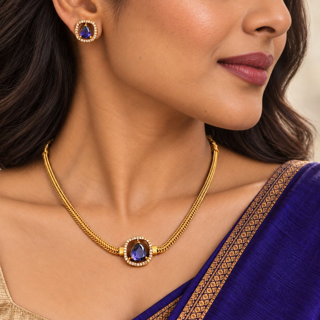 Abhaa: Minamalist Purple Blue Stone Gold Toned Necklace and Earring Set