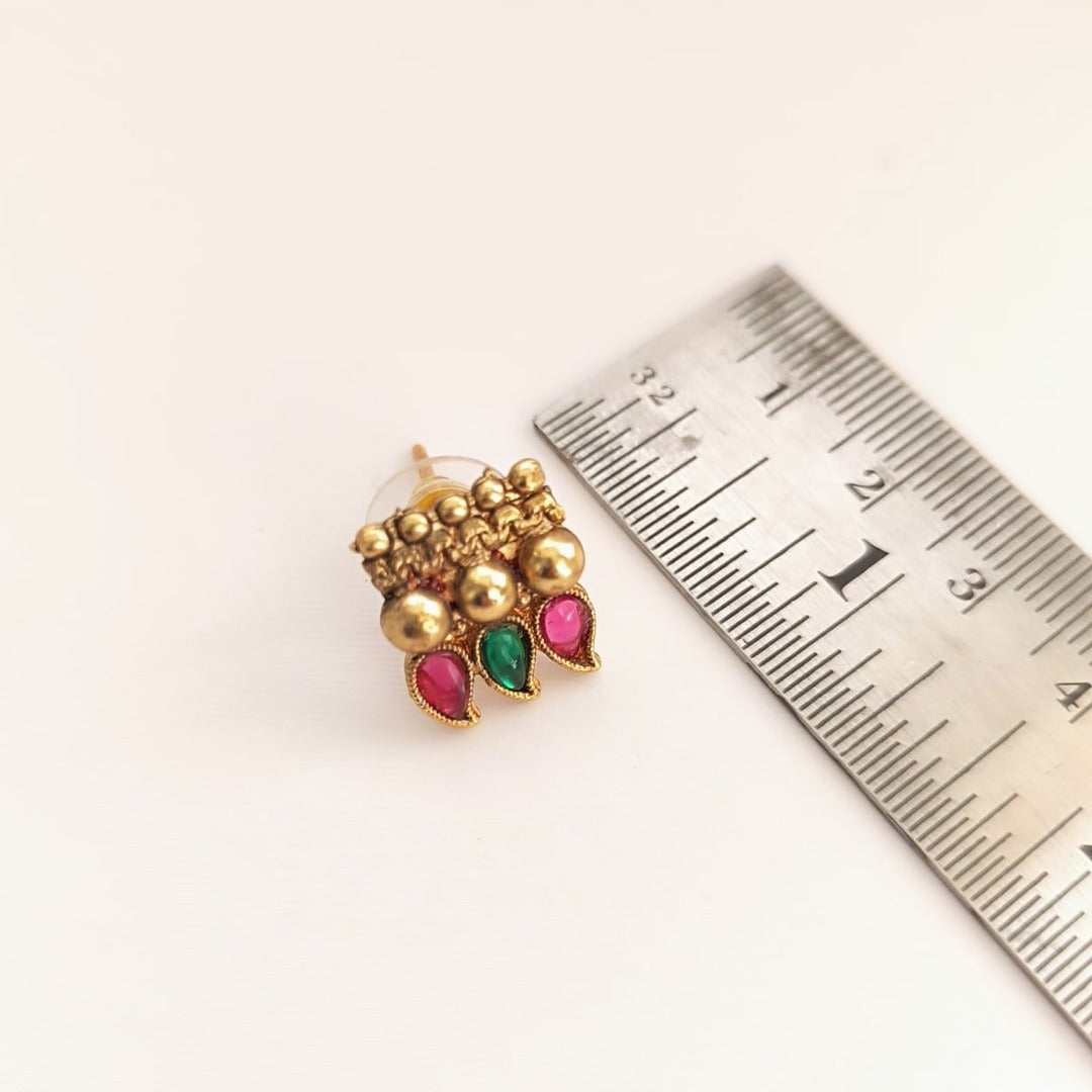 Meher :Gold Toned Stone Studded Necklace and Earring Set