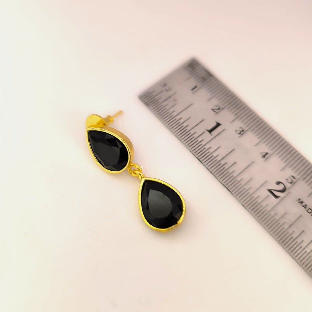 Nishka: Gold Toned Black Stone Necklace and Earring Set