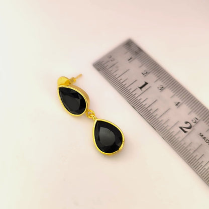 Nishka: Gold Toned Black Stone Necklace and Earring Set