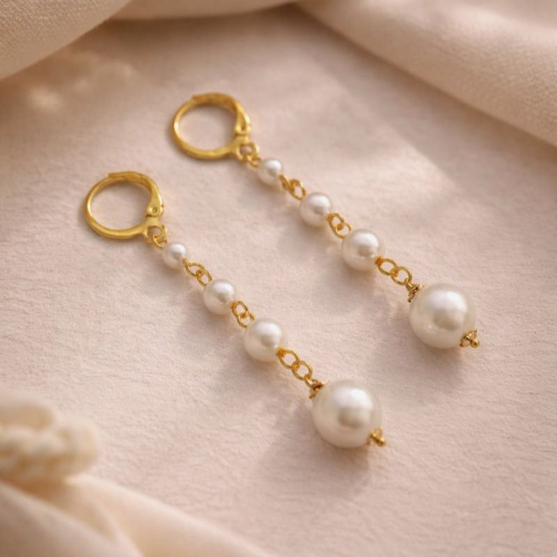 Dewdrop Cascade: Handcrafted Gold Toned Pearl Earring