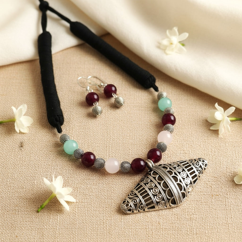 Saanjh: Beaded Silver Toned Pendant and Earring Set