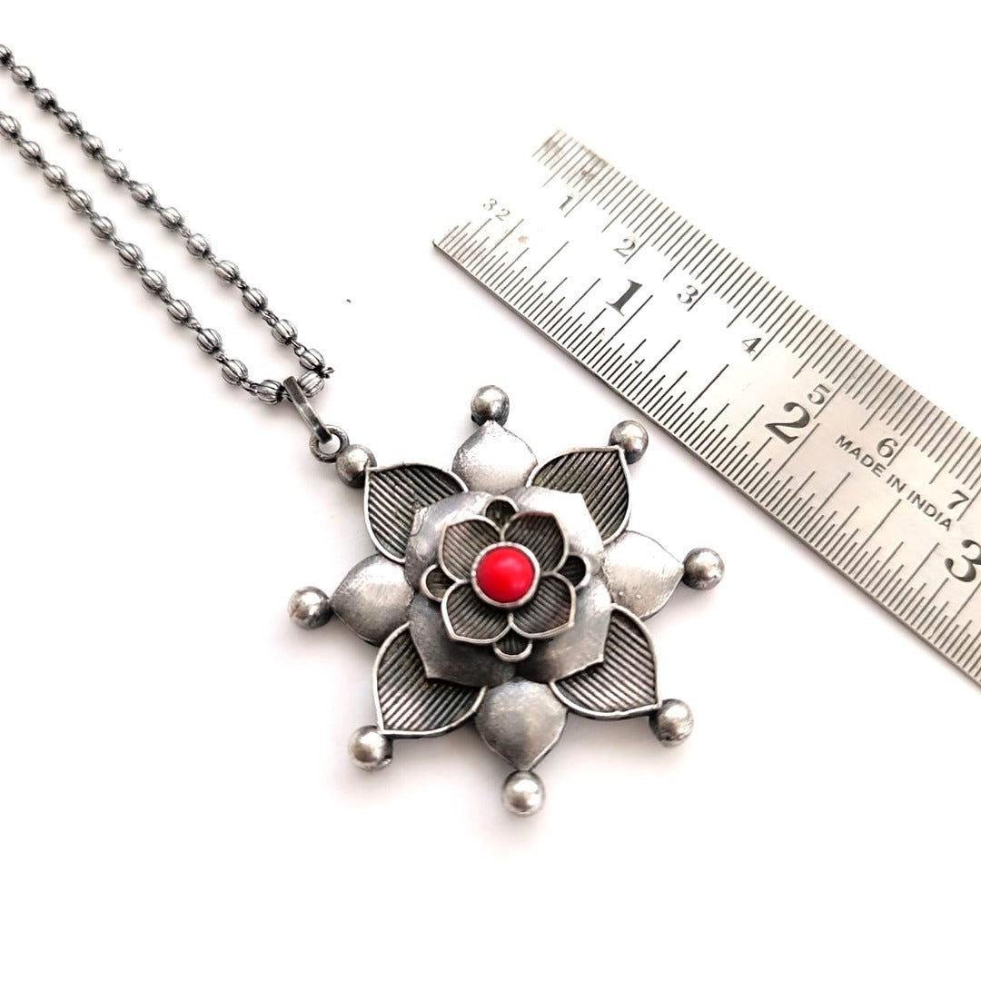 Silver Zenith: Silver Toned Coral Stone Pendant and Earring Set